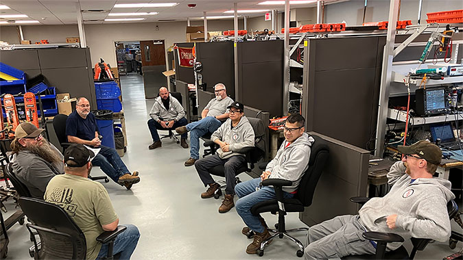 CRF team members talk safety during a briefing. From left to right: Daniel Spangler, Merlin “Skip” Dixon, Jeff Ost, Anthony Hall, Corey Croxell, Nam Nguyen, Ben Truong and Kyle Olson CRF team members talk safety during a briefing. From left to right: Daniel Spangler, Merlin “Skip” Dixon, Jeff Ost, Anthony Hall, Corey Croxell, Nam Nguyen, Ben Truong and Kyle Olson