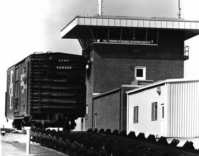 Argentine hump with a car rolling down into classification tracks, circa 1970s. Argentine hump with a car rolling down into classification tracks, circa 1970s.