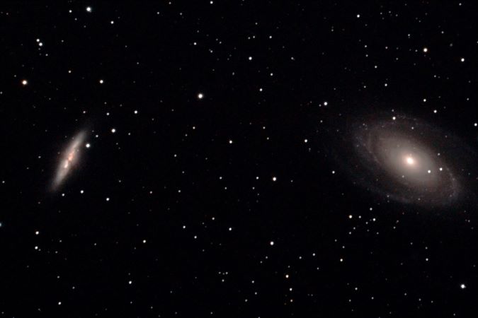 Fortner’s image of the M81 (right) and M82 (left), a pair of local galaxies that are falling toward each other just like the Andromeda Galaxy and our own galaxy, the Milky Way. They are about 150,000 light years apart. Fortner’s image of the M81 (right) and M82 (left), a pair of local galaxies that are falling toward each other just like the Andromeda Galaxy and our own galaxy, the Milky Way. They are about 150,000 light years apart.