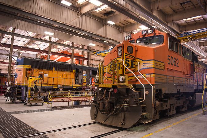 Two locomotives await repair in the diesel shop at Barstow Two locomotives await repair in the diesel shop at Barstow