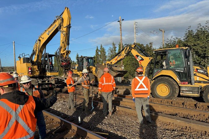 Engineering teams pause frequently to discuss job safety. Engineering teams pause frequently to discuss job safety.