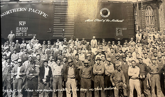 Kimberly’s great-grandfather, front row with his foot on the ledge Kimberly’s great-grandfather, front row with his foot on the ledge