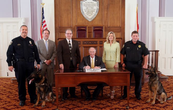 Railroad Police K-9 Protection Bill signing by Alabama Governor Robert Bentley. BNSF Senior Special Agent Bryan Schaffer and Faust are at left. Railroad Police K-9 Protection Bill signing by Alabama Governor Robert Bentley. BNSF Senior Special Agent Bryan Schaffer and Faust are at left.