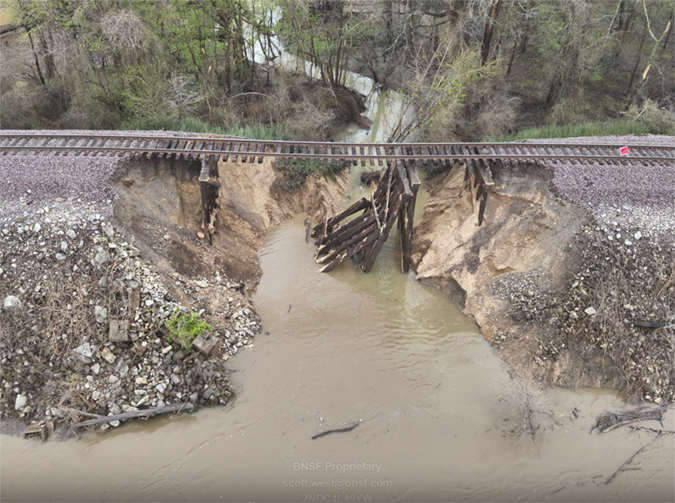 Flooding washed away a culvert near Wittenberg, Missouri. Flooding washed away a culvert near Wittenberg, Missouri.