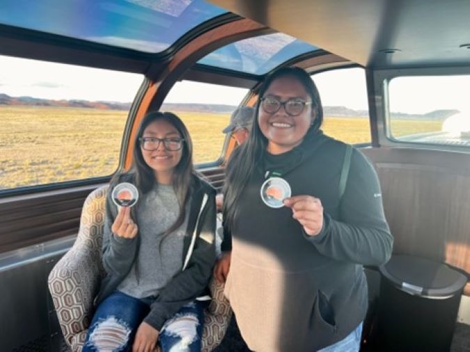 Crystal and Kayla, members of the Northern New Mexico Big Brothers Big Sisters organization, ride the BNSF train. Crystal and Kayla, members of the Northern New Mexico Big Brothers Big Sisters organization, ride the BNSF train.