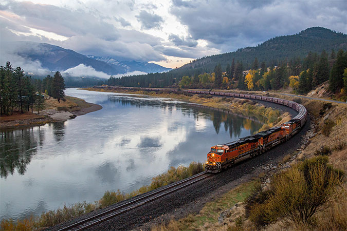 A BNSF grain train winds through southern Montana. A BNSF grain train winds through southern Montana.
