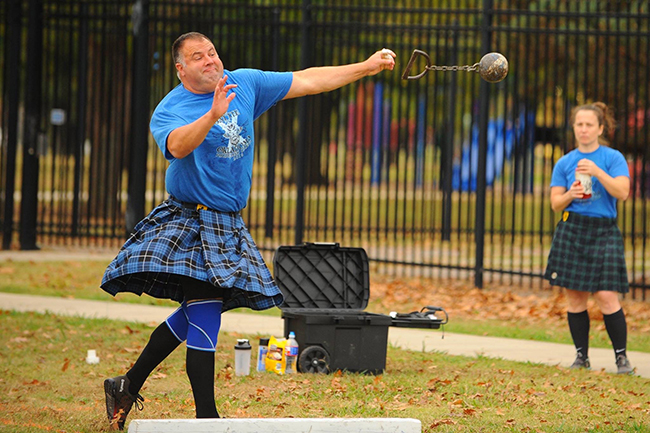 Wearing his family clan tartan, Tedd competes in the weight-for-distance event. Wearing his family clan tartan, Tedd competes in the weight-for-distance event.