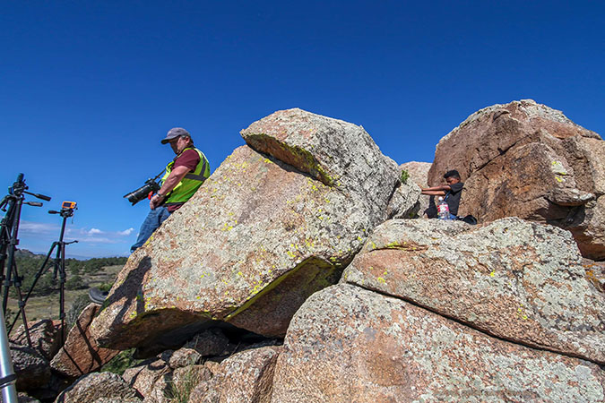 Daecian behind a boulder as he and Derek Buffie Brown wait for a train. Daecian behind a boulder as he and Derek Buffie Brown wait for a train.