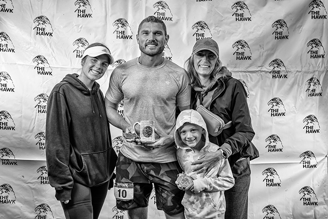 With family and first-place finisher award and buckle. Photo by Rick Mayo/Mile 90 Photography With family and first-place finisher award and buckle. Photo by Rick Mayo/Mile 90 Photography