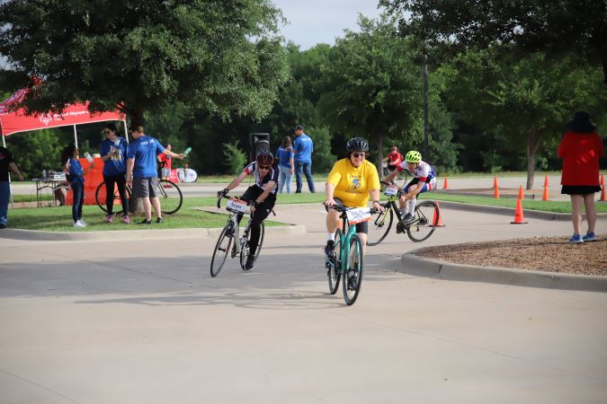 Special Olympics athletes competing in the cycling event. Special Olympics athletes competing in the cycling event.