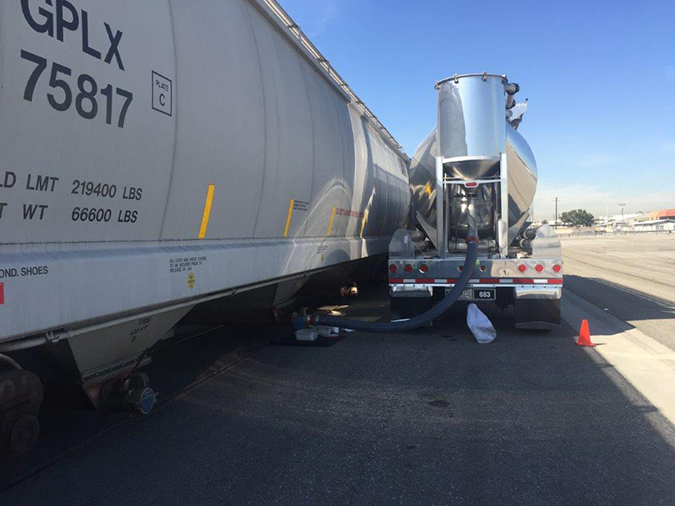 A truck-rail car transfer by premier transloader Plastic Express. A truck-rail car transfer by premier transloader Plastic Express.