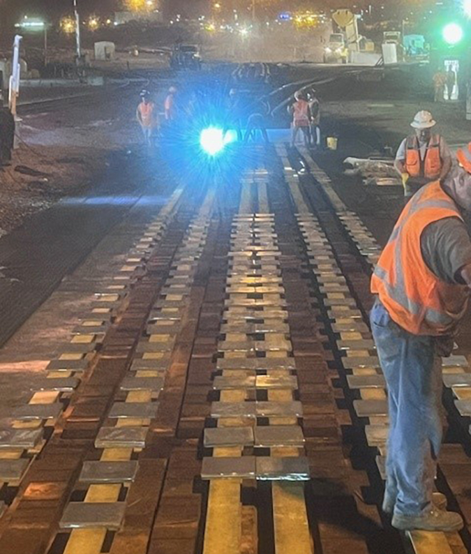 Crews retrofit the foundation for the new master retarder. Crews retrofit the foundation for the new master retarder.