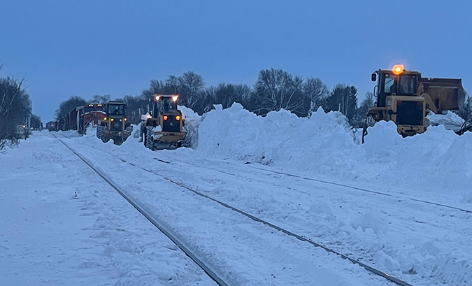 Front-end loaders are among the types of equipment used to clear tracks. Front-end loaders are among the types of equipment used to clear tracks.